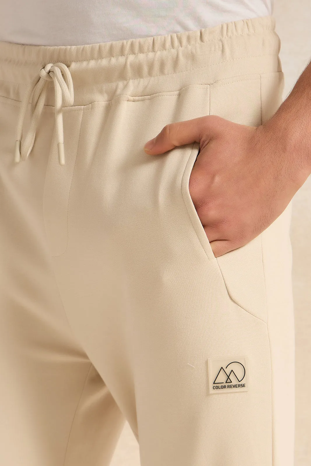 Men Beige Pleated Interlock Lounge Active Pants