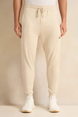 Men Beige Pleated Interlock Lounge Active Pants